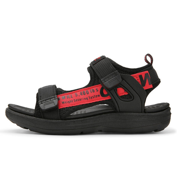 Black sandal with red straps on a white background
